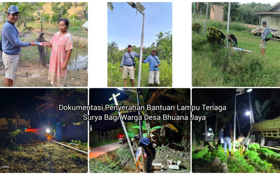 Frend Effendy Kepala Desa Bhuana Jaya Menyerahkan Bantuan Penerangan Jalan Kepada Warga